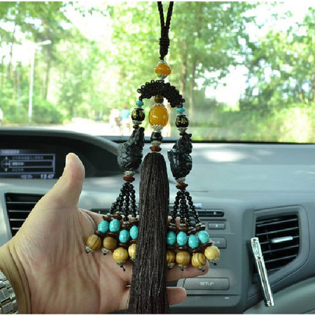 The new car pendant Tibetan 

style ebony Ssangyong ornaments brave car linked to the automotive 

supplies Jushi